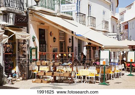 Stock Photography - An Outdoor Restaurant Patio; Lagos Algarve Portugal. Fotosearch