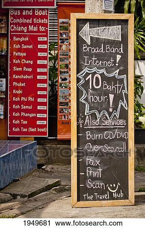 Stock Image - An Outdoor Sign Advertising Internet Services; Chiang Mai Thailand. Fotosearch