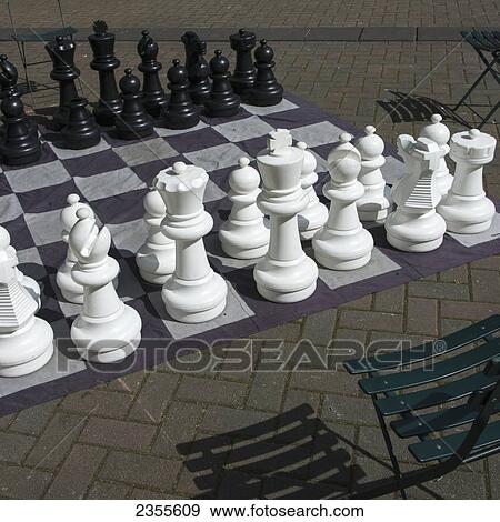 An Over-Sized Game Of Chess On The Ground In Occidental Park; Seattle, Washington, United States Of America View Large Photo Image Stock Photo - An Over-Sized Game Of Chess On The Ground In Occidental Park; Seattle, Washington, United States Of America. Fotosearch