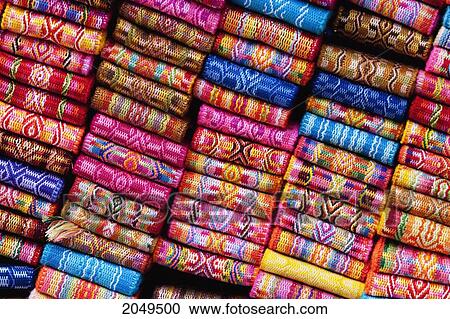 Stock Image - Andean Textile Belts For Sale At The Saturday Crafts Market, Otavalo, Imbabura, Ecuador. Fotosearch