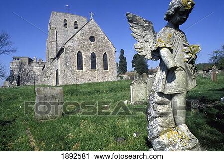 Angel Statue And Graves Outside Lympne Church View Large Photo Image Stock Image - Angel Statue And Graves Outside Lympne Church. Fotosearch