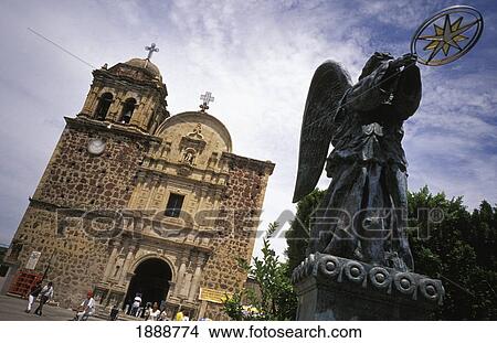 Picture - Angel Statue Outside Church In Square. Fotosearch