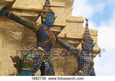 Angels Hold Up A Stupa At Wat Phra Kaew Temple; Bangkok, Thailand View Large Photo Image Stock Photography - Angels Hold Up A Stupa At Wat Phra Kaew Temple; Bangkok, Thailand. Fotosearch