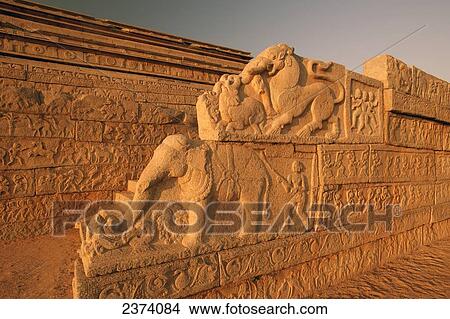 Animal figures carved into an ornate wall; Hampi, Karnataka, India View Large Photo Image Picture - Animal figures carved into an ornate wall; Hampi, Karnataka, India. Fotosearch