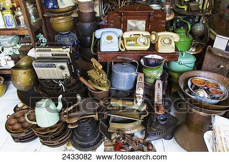 Stock Image - Antiques for sale at the Triwindu Market, Surakarta (Solo), Central Java, Indonesia. Fotosearch