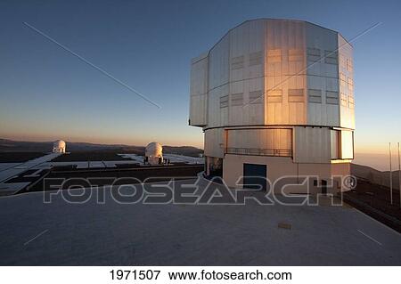 Stock Photo - Antu (Sun) Unit Telescope 1, Belonging To The Very Large Telescope (Vlt) Operated By The European Southern Observatory On Cerro Paranal At Sunset, Antofagasta Region, Chile. Fotosearch