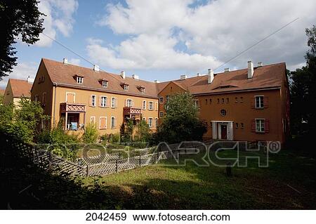 Apartment Building In Falkenberg Garden City, Part Of The Berlin Modernism Housing Estates, Berlin, Germany View Large Photo Image Stock Photo - Apartment Building In Falkenberg Garden City, Part Of The Berlin Modernism Housing Estates, Berlin, Germany. Fotosearch
