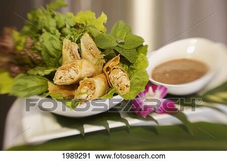 Appetizing Plate Of Thai Spring Rolls And Dipping Sauce. View Large Photo Image Stock Image - Appetizing Plate Of Thai Spring Rolls And Dipping Sauce.. Fotosearch