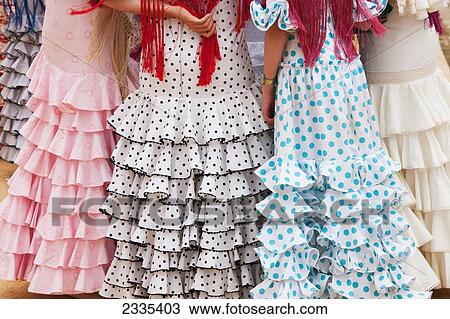 April Feria Festival, Girls In Traditional Dresses; Seville, Andalucia, Spain View Large Photo Image Stock Image - April Feria Festival, Girls In Traditional Dresses; Seville, Andalucia, Spain. Fotosearch
