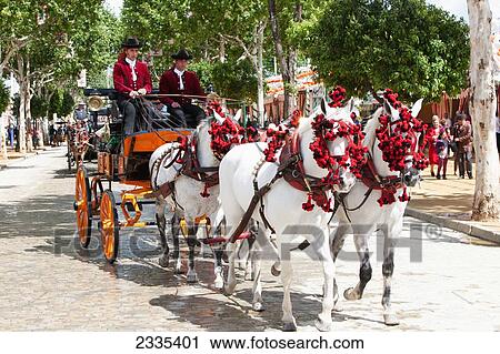 April Feria Festival, Horse Drawn Wagon; Seville, Andalucia, Spain View Large Photo Image Stock Image - April Feria Festival, Horse Drawn Wagon; Seville, Andalucia, Spain. Fotosearch