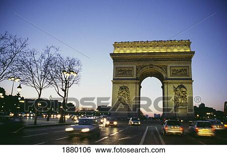 Stock Photograph - Arc Du Triomphe At Dusk With Traffic, Paris. Fotosearch