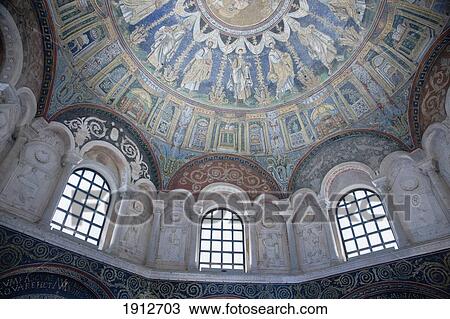 Stock Image - Arch Windows With Decorative Stucco Reliefs In A Domed Ceiling In The Neonian Baptistry; Ravenna, Emilia-Romagna, Italy. Fotosearch