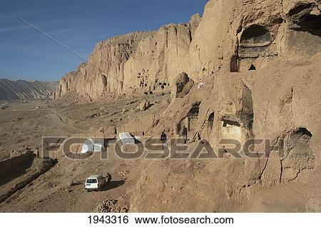 Stock Photograph - Archaeological Teams Working On The Restoration Of The Cliffs At Bamiyan, Bamian Province, Afghanistan. Fotosearch