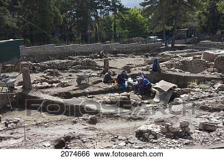 Stock Photograph - Archaeologists Working In The Excavations Of The Polyconchal Basilica At Plaoshnik, Ohrid, Macedonia. Fotosearch