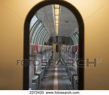 Stock Image - Arched Doorway And Aisle Of A Train Car; Locarno, Ticino, Switzerland. Fotosearch