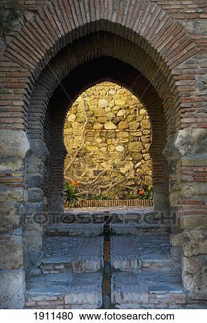 Stock Image - Arched Passage Of Alcazaba, Malaga, Andalucia, Spain. Fotosearch