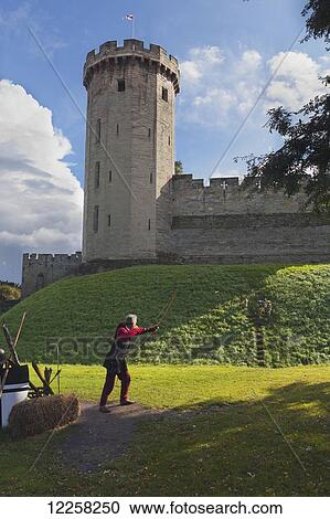 Archery display at Warwick Castle; Warwick, Warwickshire, England View Large Photo Image Stock Image - Archery display at Warwick Castle; Warwick, Warwickshire, England. Fotosearch