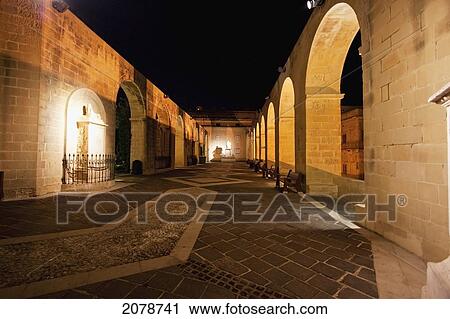Arches And Statue Of Sir Joseph Nicholas Zammit In Barrakka Gardens At Night, Valletta, Malta View Large Photo Image Stock Image - Arches And Statue Of Sir Joseph Nicholas Zammit In Barrakka Gardens At Night, Valletta, Malta. Fotosearch