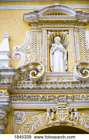 Stock Photo - Architectural Detail Of Church's Facade, Statue Of Saint; Antigua, Guatemala. Fotosearch