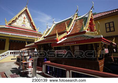 Stock Photo - Architecture contrasts from unnamed wat in Bangkok, Thailand.. Fotosearch
