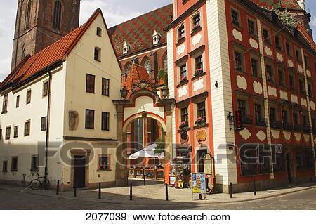 Stock Photo - Archway Between Two Houses To St. Elizabeth's Church Off Rynek Square; Wroclaw Poland. Fotosearch