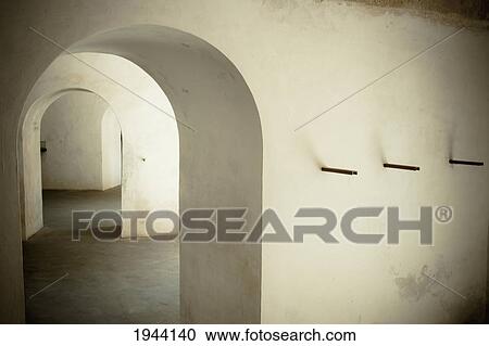 Stock Image - Archways Inside A Building With White Walls; Dakar Senegal. Fotosearch