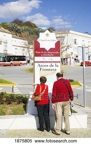 Arcos De La Frontera, Andalusia, Spain; People Reading A Sign On The Street View Large Photo Image Stock Photography - Arcos De La Frontera, Andalusia, Spain; People Reading A Sign On The Street. Fotosearch