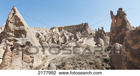 Stock Image - Arid Landscape Of Rock Formations; Aktepe Nevsehir Turkey. Fotosearch
