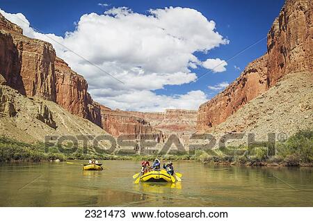 Stock Image - Arizona, Grand Canyon National Park, Friends Rafting On The Colorado River, Calm Water. Editorial Use Only.. Fotosearch