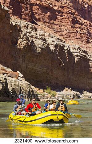 Stock Image - Arizona, Grand Canyon National Park, Friends And Family Rafting On The Colorado River. Editorial Use Only.. Fotosearch