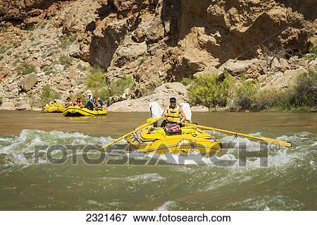 Arizona, Grand Canyon National Park, Tourists Rafting On The Colorado River. Editorial Use Only. View Large Photo Image Stock Photo - Arizona, Grand Canyon National Park, Tourists Rafting On The Colorado River. Editorial Use Only.. Fotosearch