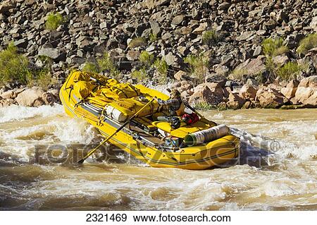 Stock Photo - Arizona, Grand Canyon National Park, Woman Rafting On The Colorado River. Editorial Use Only.. Fotosearch