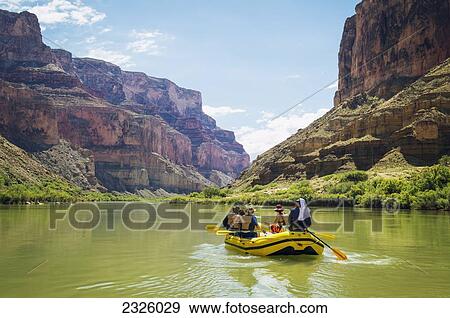 Arizona, Grand Canyon National Park, Group Of Friends Rafting On The Colorado River, Calm Water. Editorial Use Only. View Large Photo Image Stock Photo - Arizona, Grand Canyon National Park, Group Of Friends Rafting On The Colorado River, Calm Water. Editorial Use Only.. Fotosearch