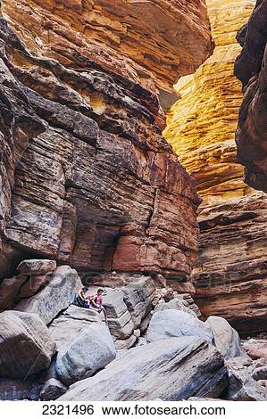 Arizona, Grand Canyon National Park, Two Friends Playing Music In Black Tail Slot Canyon. View Large Photo Image Stock Photograph - Arizona, Grand Canyon National Park, Two Friends Playing Music In Black Tail Slot Canyon.. Fotosearch