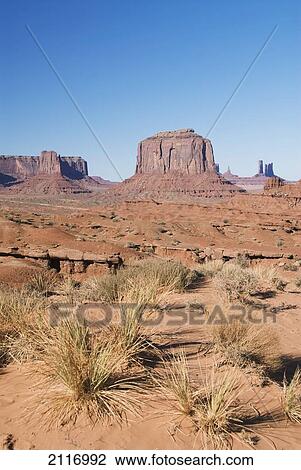 Stock Image - Arizona, Navajo Tribal Park, Monument Valley, View of the Merrick Butte from John Ford's Point Overlook.. Fotosearch