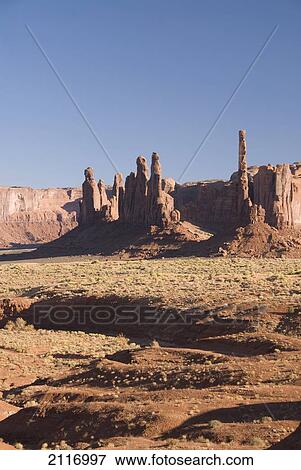 Stock Photo - Arizona, Navajo Tribal Park, Monument Valley, View of the Totem Pole and Yei Bi Chei.. Fotosearch
