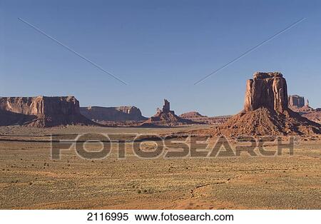 Stock Photography - Arizona, Navajo Tribal Park, Monument Valley, View of the Merrick Butte in desert.. Fotosearch