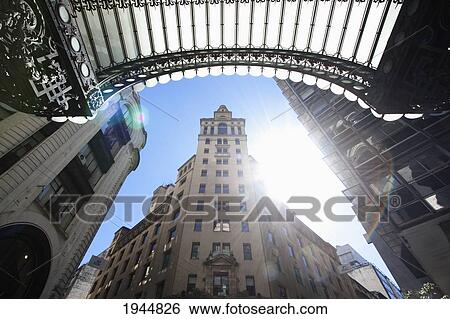 Stock Photograph - Art Nouveau awning made of cast iron and glass and HSBC bank, Buenos Aires, Capital Federal, Argentina. Fotosearch
