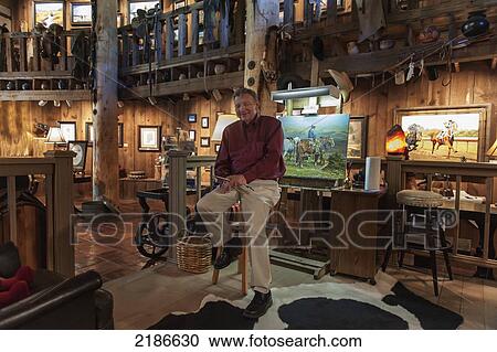 Stock Image - Artist Kenneth Wyatt At His Studio Home, Best Known For His Wild West Cowboy Paintings, His Work Has Been Collected By Queen Elizabeth Ii And Ronald Reagan, Tulia, Texas, Usa. Fotosearch
