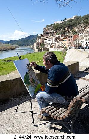 Artist Painting The Views Of Miravet, Ebro River And Castle, Miravet, Tarragona, Spain View Large Photo Image Picture - Artist Painting The Views Of Miravet, Ebro River And Castle, Miravet, Tarragona, Spain. Fotosearch