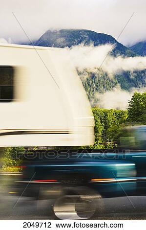 Artist's Choice: Camper On Yellowhead Highway, And Fog Over Mountains At Sunrise, Northern British Columbia View Large Photo Image Stock Image - Artist's Choice: Camper On Yellowhead Highway, And Fog Over Mountains At Sunrise, Northern British Columbia. Fotosearch