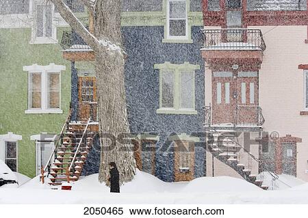 Stock Photography - Artist's Choice: Snow Storm In Front Of Houses In Winter, Montreal, Quebec. Fotosearch