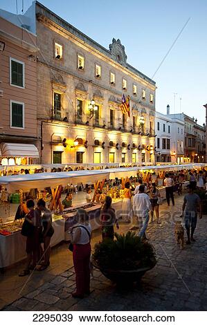 Stock Photo - Arts And Crafts Market In Placa De La Catedral In Ciutadella At Night, Menorca, Balearic Islands, Spain. Fotosearch