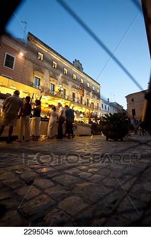 Arts And Crafts Market In Placa De La Catedral In Ciutadella At Night, Menorca, Balearic Islands, Spain View Large Photo Image Stock Photography - Arts And Crafts Market In Placa De La Catedral In Ciutadella At Night, Menorca, Balearic Islands, Spain. Fotosearch