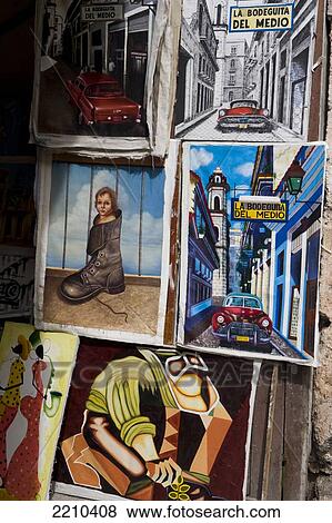 Stock Photo - Artwork on sale to tourists in Old Havana, Cuba.. Fotosearch