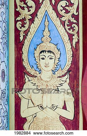 Picture - Artwork on the doorway of the temple, Wat Phra That Jom Jaeng; Mae Sariang, Thailand. Fotosearch