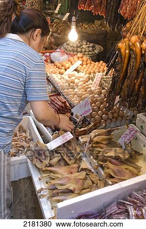 Stock Image - Asia, China, Hong Kong, Wanchai Market Fishmonger. Fotosearch
