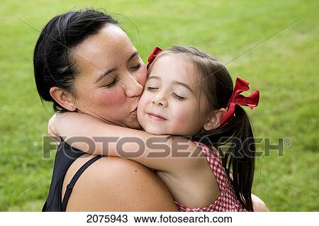 Asian-Caucasian Mother And Daughter Hugging; Ontario Canada View Large Photo Image Stock Image - Asian-Caucasian Mother And Daughter Hugging; Ontario Canada. Fotosearch