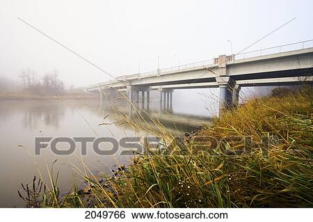 Assiniboine River And Charleswood Bridge On Foggy Fall Morning, Winnipeg, Manitoba View Large Photo Image Stock Photograph - Assiniboine River And Charleswood Bridge On Foggy Fall Morning, Winnipeg, Manitoba. Fotosearch