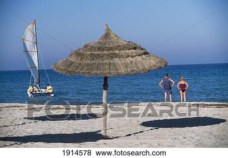 Stock Photo - At Sidi Mahres Beach. Fotosearch